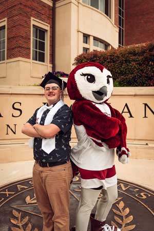 Andy Hackett with Oakley the barn owl.