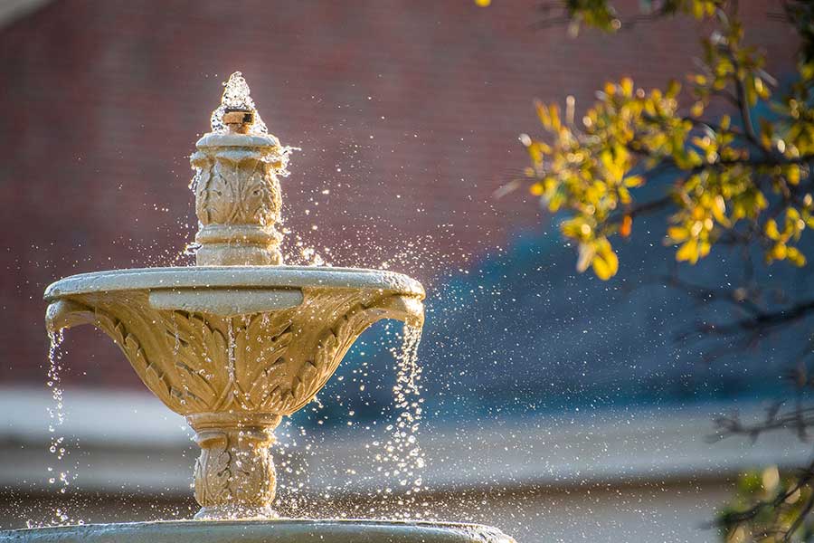 fountain with water running off it