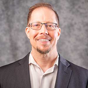 headshot of John Alagood