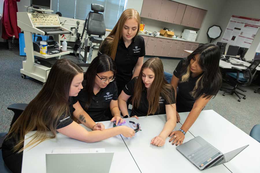 TWU's 2021 all-female team of Texas Woman&rsquo;s University kinesiology seniors in the NASA-sponsored engineering design challenge.