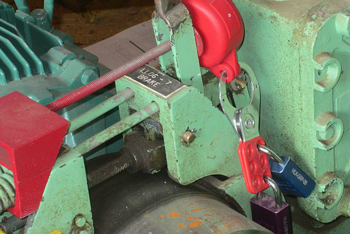 A lockout device applied to a hoist brake.