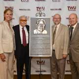 The unveiling of the Woodcock Institute dedication plaque